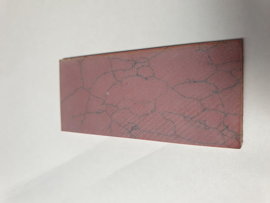 <p>Bloody Jasper reconstituted stone blanks 30 x 70 x 1.5mm suitable for inlay. Can be cut with standard cutting tools - jewellery saw similar in characteristics to mother of pearl (hardness approx. 3. Can be sanded and polished same way as shell material. All pcs are A grade good on both sides.</p>