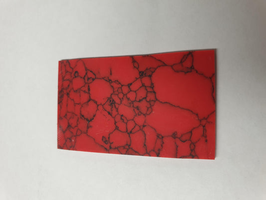 <p>Red Marble H064 reconstituted stone blanks 30 x 50 x 1.5mm suitable for inlay. Can be cut with standard cutting tools - jewellery saw similar in characteristics to mother of pearl (hardness approx. 3. Can be sanded and polished same way as shell material.</p>