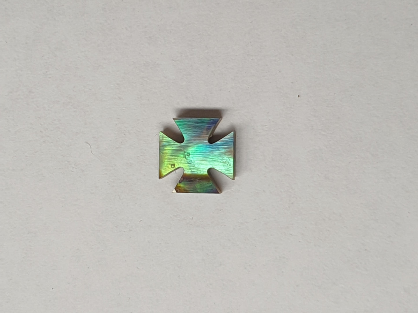 <p>Paua abalone inlay iron cross size 6 x 1.5mm. Some uses include fretboard markers, musical instrument inlay, furniture inlay, marquetry, pool cue inlay and other general decorative inlay and jewellery applications.</p>