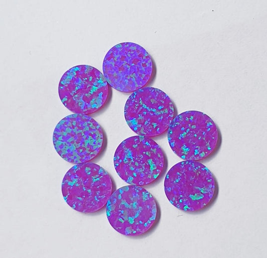 <p>Opal dots OP52 6 x 1.3mm flat pcs made to specific diameter and thickness made from manufactured opal suitable for inlay, fretboard markers, jewellery, Opal dots can be worked same way as mother of pearl and are of similar hardness.</p>