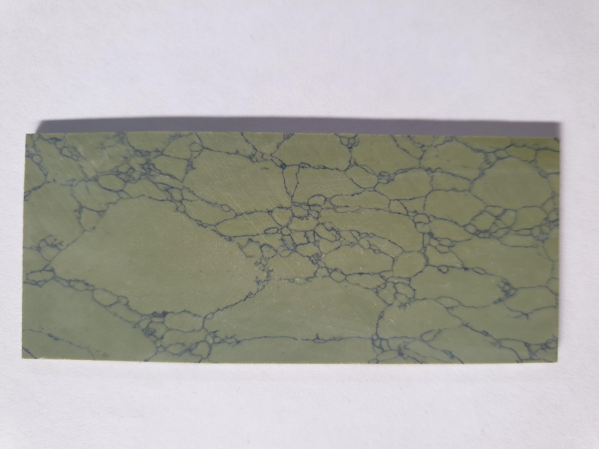 <p>Olive stone artificial stone blanks 30 x 70 x 1.5mm suitable for inlay. Can be cut with standard cutting tools - jewellery saw similar in characteristics to mother of pearl (hardness approx. 3. Can be sanded and polished same way as shell material. All piecs are A grade good on both sides.</p>