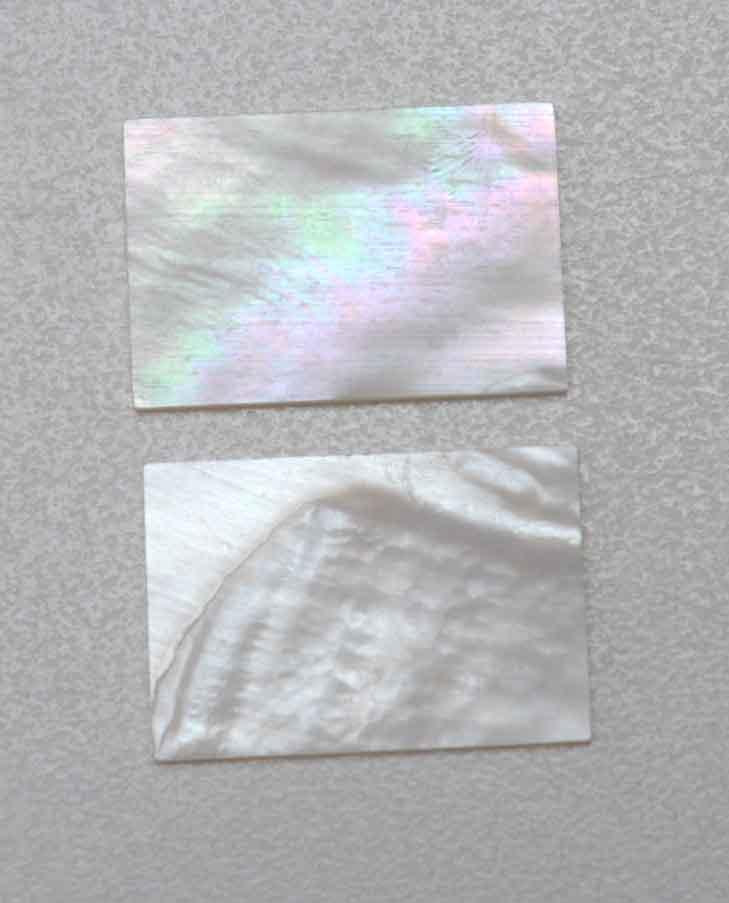 <p>White Mother of Pearl flat inlay blanks size 35mm (1.38") width x 50mm (1.97") length x 1mm (0.04") thickness A grade good on both sides.</p>