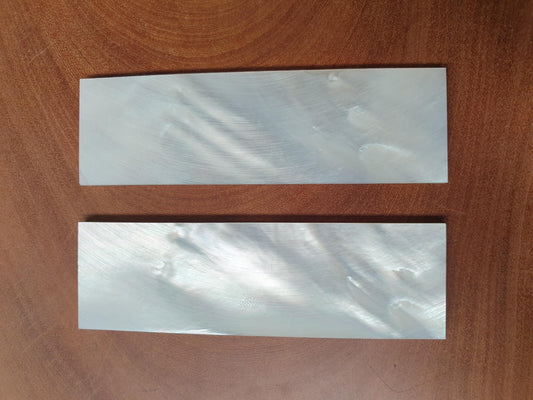 <p>White Mother of Pearl flat blanks size 30mm (1.18") width x 115mm (4.53") length x 4mm (0.157") thickness A grade good on both sides.</p>