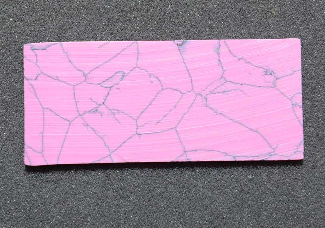 <p>Pink stone I79 artificial stone blanks 30 x 70 x 2.1mm suitable for inlay. Can be cut with standard cutting tools - jewellery saw similar in characteristics to mother of pearl (hardness approx. 3. Can be sanded and polished same way as shell material. All pcs are A grade good on both sides.</p>