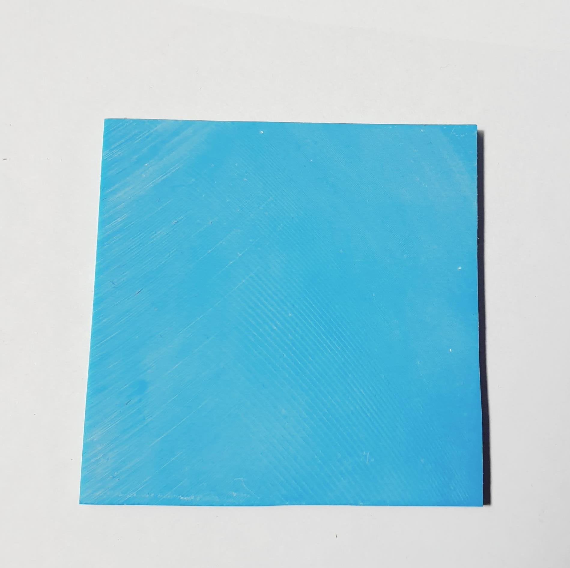 Sky Blue stone O124 artificial stone blanks 50 x 50 x 1.5mm suitable for inlay. Can be cut with standard cutting tools - jewellery saw similar in characteristics to mother of pearl (hardness approx. 3. Can be sanded and polished same way as shell material. All pcs are A grade good on both sides.