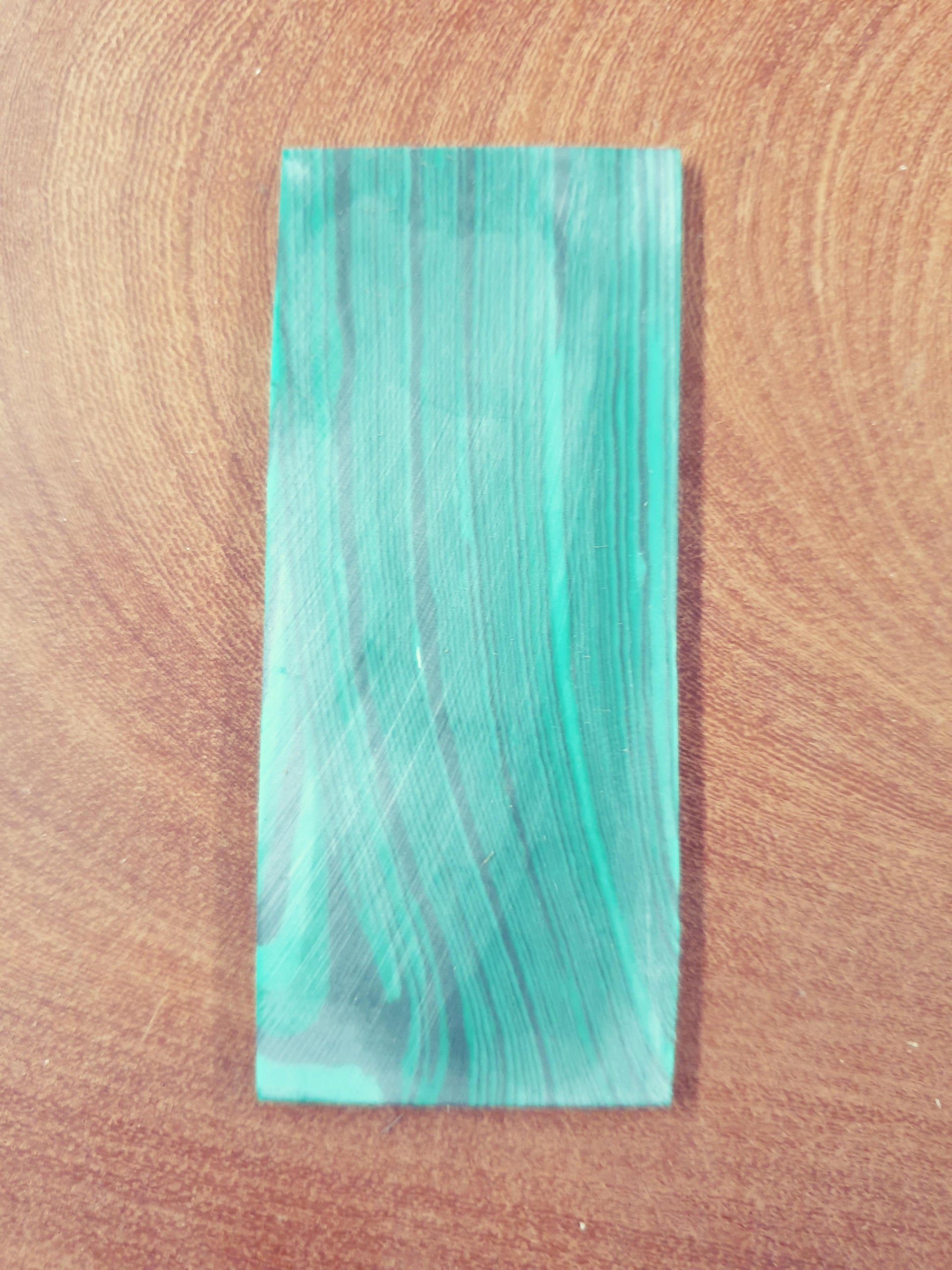 <p>Malachite C025 artificial stone blanks 30 x 70 x 2mm suitable for inlay. Can be cut with standard cutting tools - jewellery saw similar in characteristics to mother of pearl (hardness approx. 3. Can be sanded and polished same way as shell material. All pcs are A grade good on both sides.</p>