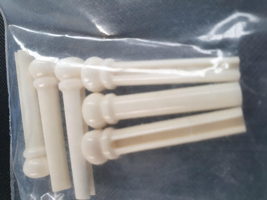 1 set (6pcs) Guitar bridge pins white bone size 1 Tapered shaft string slot running the full length of shaft. Diameter at top of shaft 5.3mm (0.21") length of shaft 22.9mm (0.9") . Will fit the following models - Martin guitars prior to 1994 (except HD-28), Collings guitars, prior to 2002, Blanchard, Garrison, Goodall, Ryan, Santa Cruz, Taylor, Larrivee D-03R and others.