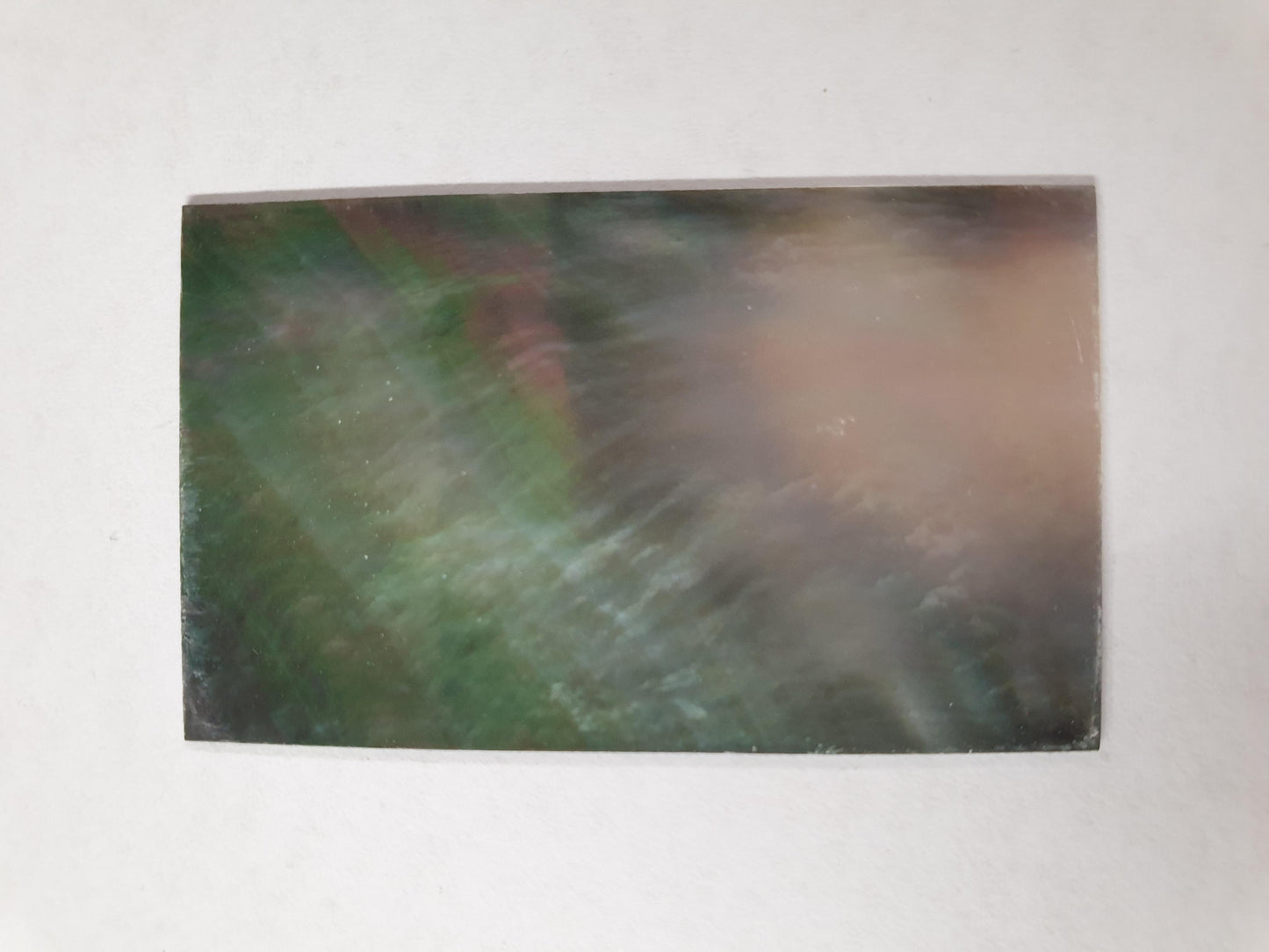 <p>Black Mother of Pearl flat inlay blanks polished 1 side size 30mm (1.18") width x 50mm (1.97") length x 0.5mm (0.0197") thickness B grade good on 1 side may have some shell skin on 1 side.</p>