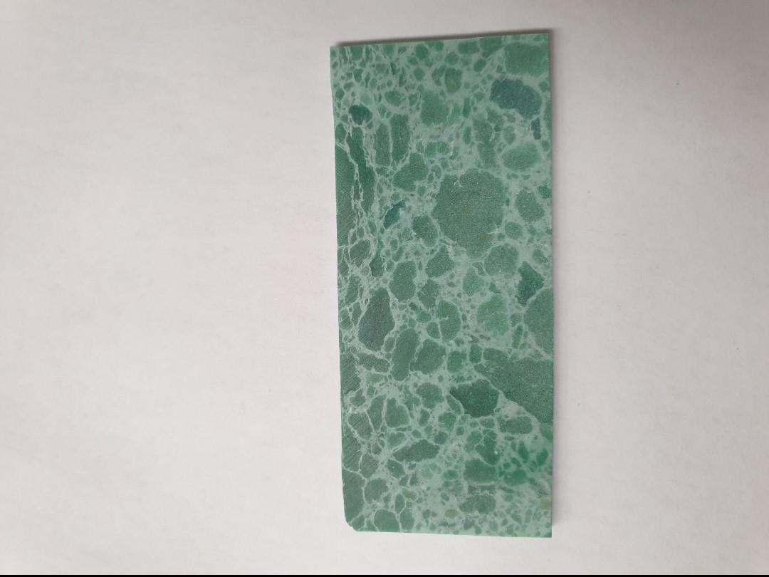 <p>Marble Green Adenium dark artificial stone blanks&nbsp;30 x 70 x 2mm suitable for inlay. Can be cut with standard cutting tools - jewellery saw similar in characteristics to mother of pearl (hardness approx. 3. Can be sanded and polished same way as shell material. All pcs are A grade good on both sides.</p>