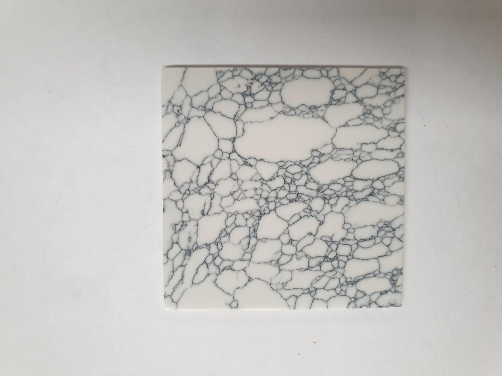  Marble Cremona artificial stone blanks 50 x 50 x 2mm polished 1 side suitable for inlay. Can be cut with standard cutting tools - jewellery saw similar in characteristics to mother of pearl (hardness approx. 3. Can be sanded and polished same way as shell material. All pcs are A grade good on both sides.