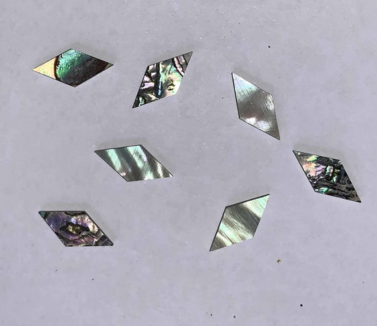 Green abalone (Mexican green abalone) diamonds size 6.7mm width x 13.3mm length x 1.5mm thickness. Some uses include fretboard markers, musical instrument inlay, furniture inlay, marquetry, pool cue inlay and other general decorative inlay and jewellery applications. All pcs are A grade.