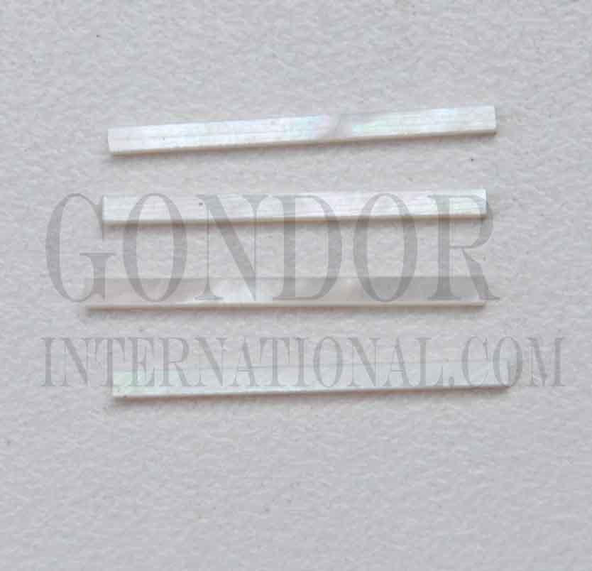 White Mother of Pearl solid shell straight strips 1.5mm (0.06") width x 25mm (1") length x 1.5mm (0.06") thickness. A grade quality good on both sides, flat and uniform in thickness and width. Ideal for use in purfling on musical instruments - Ukuleles, guitars, mandolins etc. as well as in furniture, jewellery ans other decorative applications.