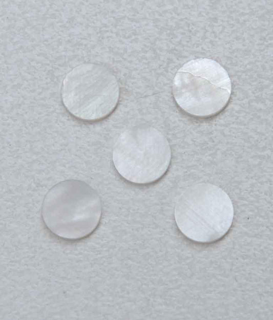 White Mother of Pearl dots 6.35mm (1/4") diameter x 2mm thickness - round flat shell pcs cut to precise diameter and thickness. Ideal for use in inlay applications - for fretboard markers, bow frog eyes and general inlay or jewellery decorations. All dots are A grade good on both sides.