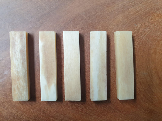 Vintage Bone nut blanks size 12mm (0.472") width x 55mm (2.16") length x 6.5mm (1/4") thickness used in musical instruments i.e. guitars, mandolins, ukuleles etc.
