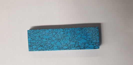 Turquoise I075 artificial stone blanks 40 x 125 x 9mm suitable for knife handles, jewellery and inlay. Can be cut with standard cutting tools - jewellery saw similar in characteristics to mother of pearl (hardness approx. 3. Can be sanded and polished same way as shell material. All pcs are A grade good on both sides.