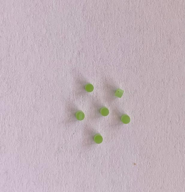 Jade SJADE dots 2mm diameter x 1.3mm thickness - round flat pcs cut to precise diameter and thickness. Ideal for use in inlay applications - for fretboard markers, and general inlay or jewellery decorations. All dots are A grade good on both sides.