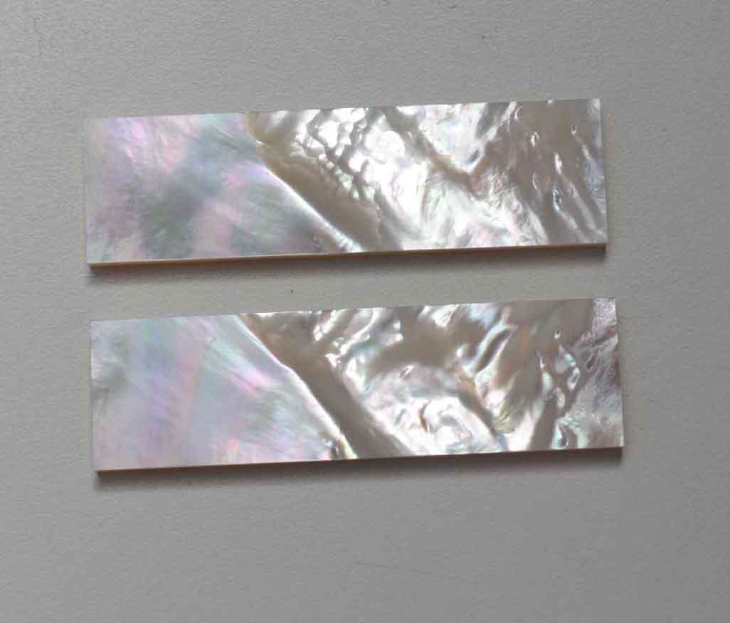 White Mother of Pearl flat inlay blanks size 30mm (1.18") width x 90mm (3.54") length x 3.5m (0.138") thickness B grade can contain some shell skin and/or cracks.