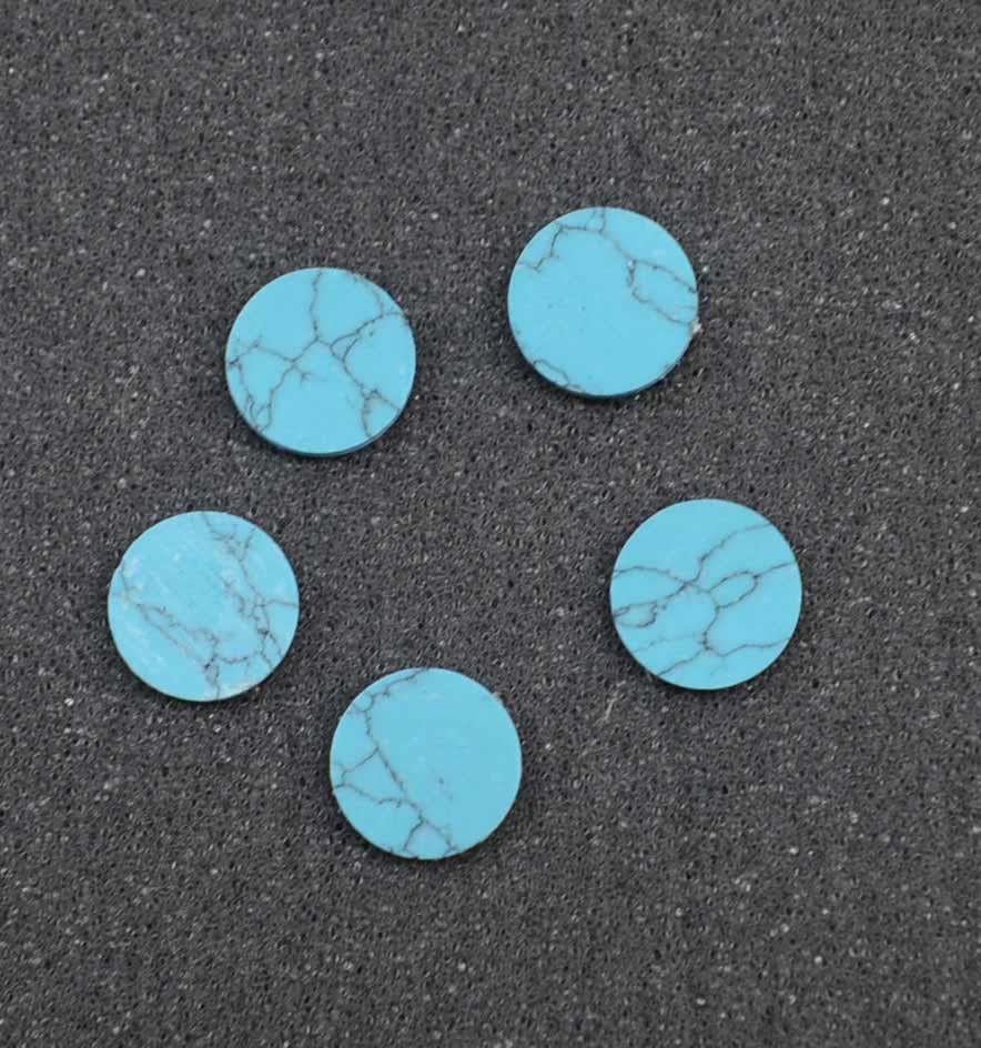 Turquoise STURM2 dots 7mm diameter x 1.3mm thickness - round flat pcs cut to precise diameter and thickness. Ideal for use in inlay applications - for fretboard markers, and general inlay or jewellery decorations. All dots are A grade good on both sides.