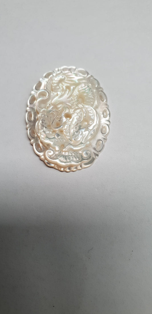 <p>White MOP cabochon Chinese zodiac Dragon size width 22.5 x length 30 x thickness 4.5mm Best grade W, MOP carving high quality precision work. Suitable for jewellery and other decorative applications. A grade.</p>