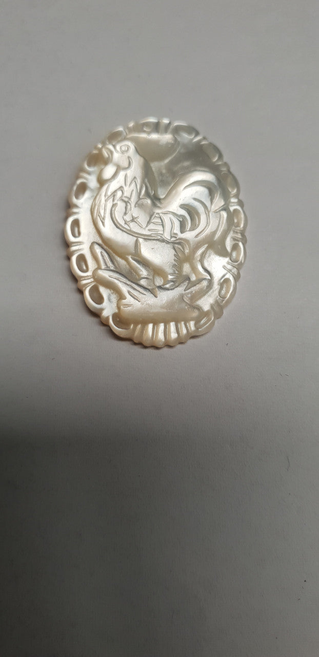 <p>White MOP cabochon Chinese zodiac Rooster size width 22.5 x length 30 x thickness 4.5mm Best grade W, MOP carving high quality precision work. Suitable for jewellery and other decorative applications. A grade.</p>