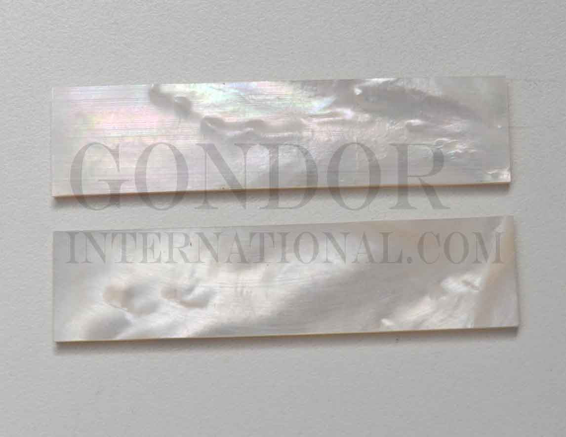 <p>White Mother of Pearl flat inlay blanks size 20mm width x 90 length x 2.5mm (0.1") thickness A grade clean on both sides.</p>